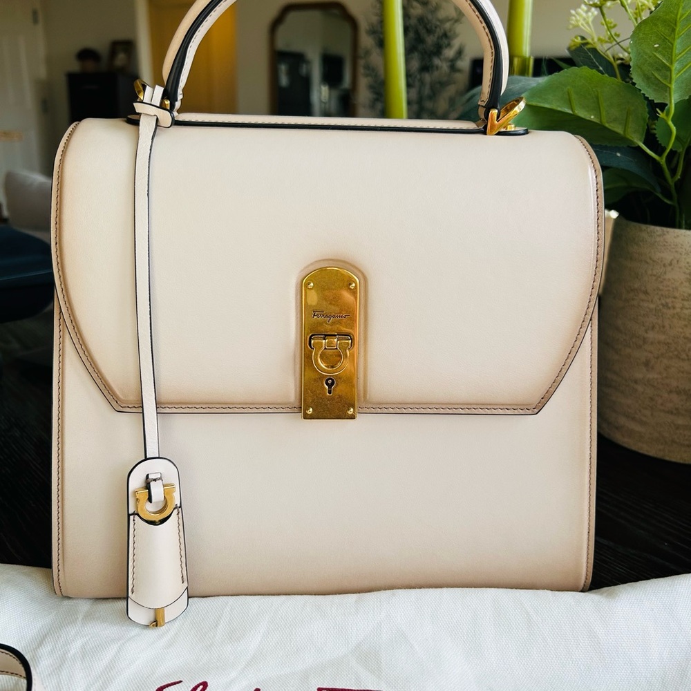 Salvatore Ferragamo Cream Satchel with Gold Accents & Brand New with tags.